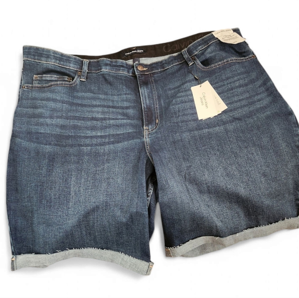 NWT Calvin Klein plus size Jean Shorts. Size 24 W. Dark blue denim